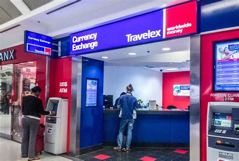 lambert airport currency exchange